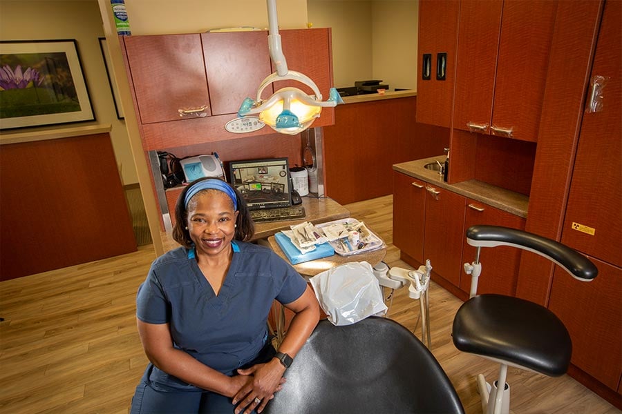 Dr. Lisa Sibley, DDS, treats patients at the Catholic Charities Fort Worth dental clinic.