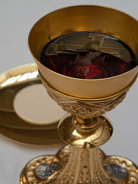 A host and chalice.