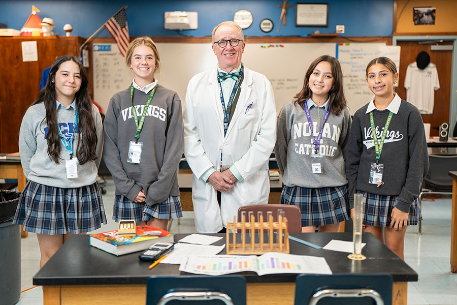 Don Cox with four students