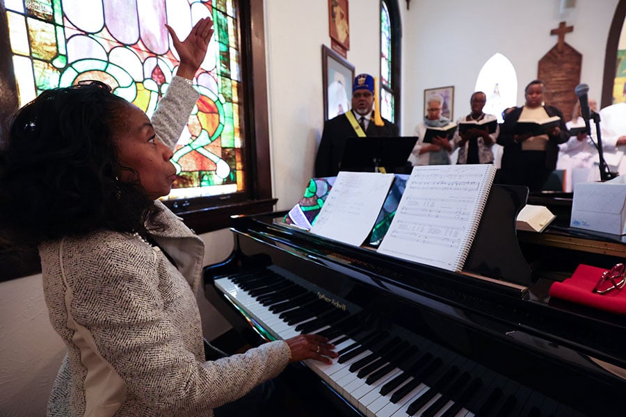 Donna Renay Patrick sits at piano