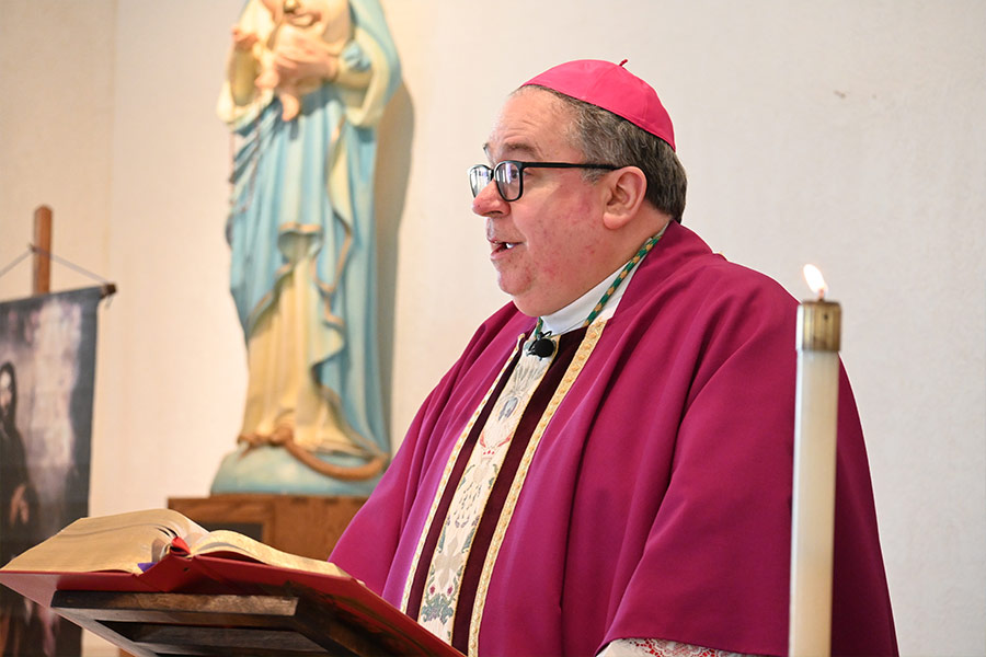 Bishop Michael Olson speaks to the congregation of St. John Parish in Strawn on March 19, 2022.