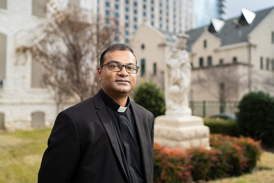 Father Binoy Kurian, TOR, outside of St. Patrick Cathedral on Jan. 19, 2022. Fr. Kurian is the new hospital chaplain for the Diocese of Fort Worth. Currently, he visits patients at five Fort Worth hospitals.