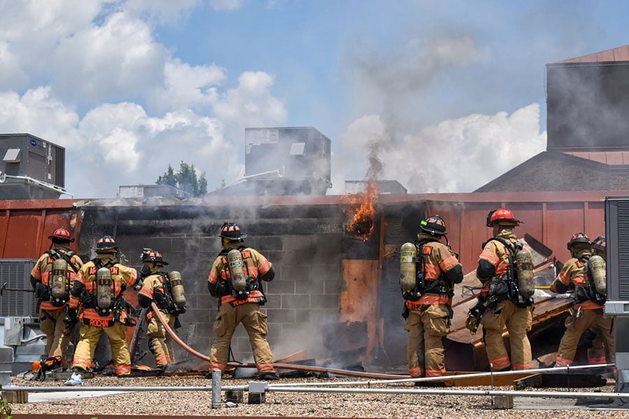 firefighters on roof