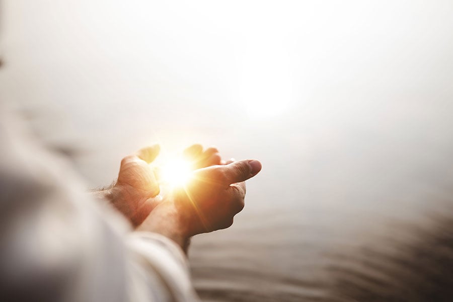 Jesus holding light