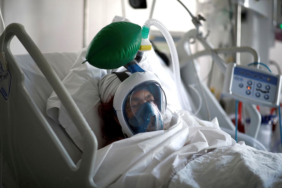 patient suffering from COVID-19 is seen on a ventilator