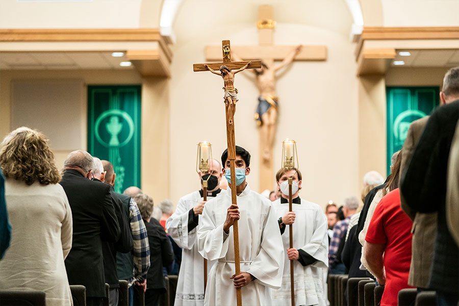 Jonathan Mendes leads the exit procession after the annual Respect Life Mass on January 24, 2022 at St. Mark Parish in Arygle.