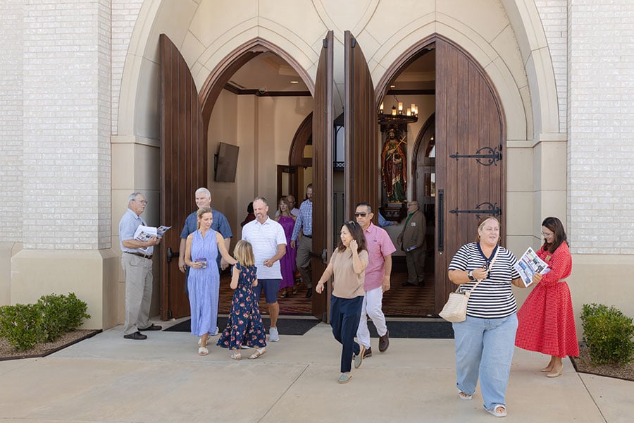 people leaving Church doors