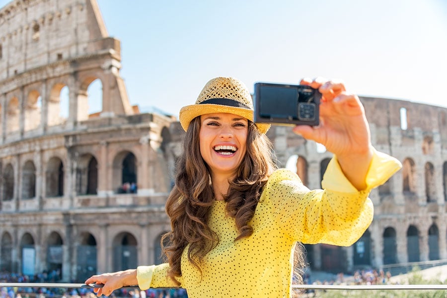 woman takes selfie in rome