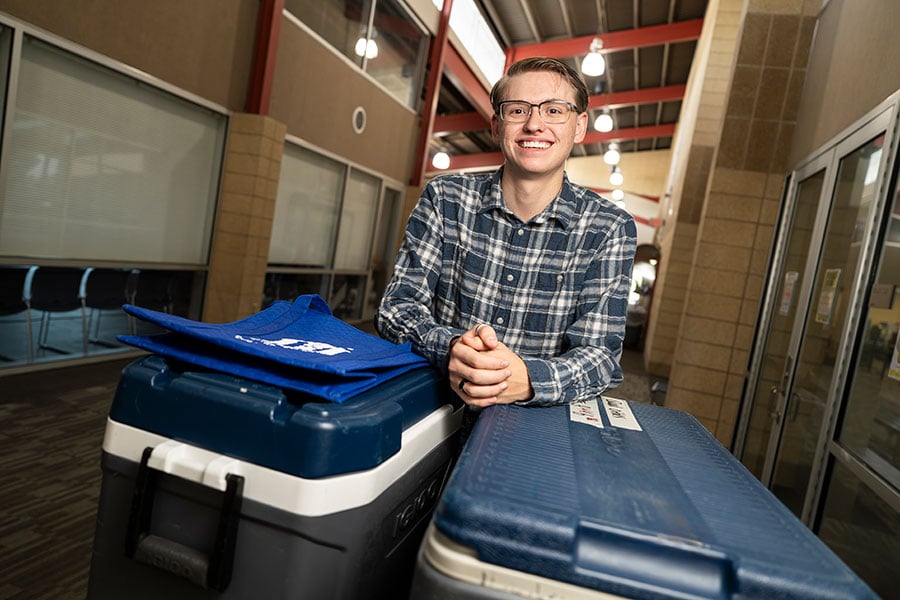 man with coolers