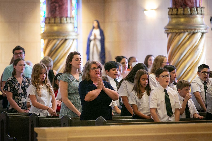 Barbara Plaisted at Mass with students