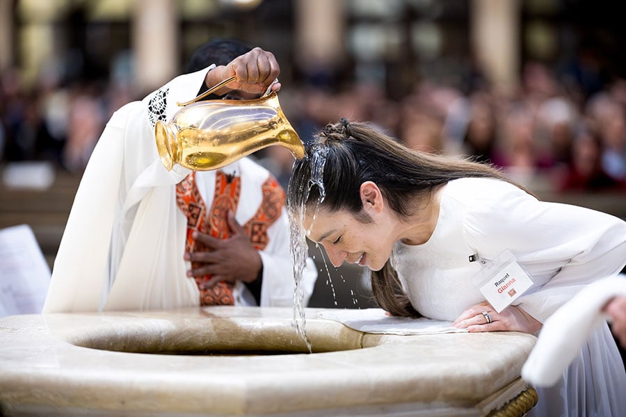 woman getting baptized