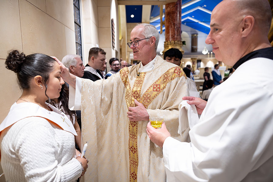 Priest confirms a woman