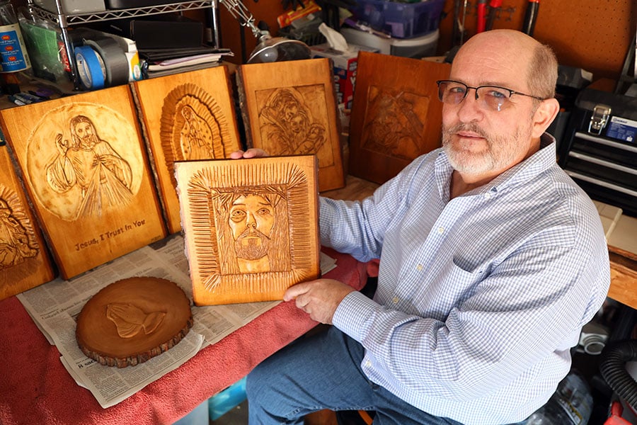 Ed Proskie with carvings