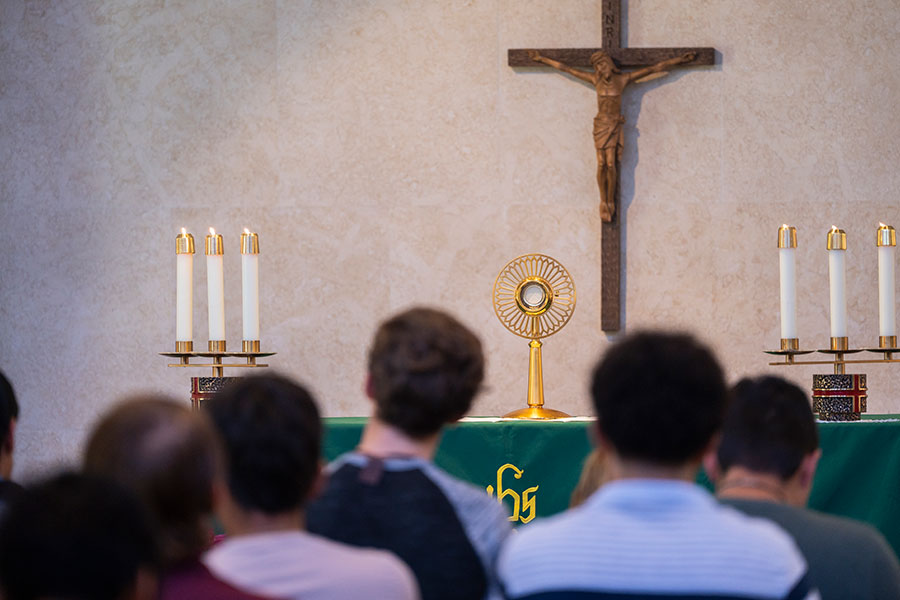 young men at adoration