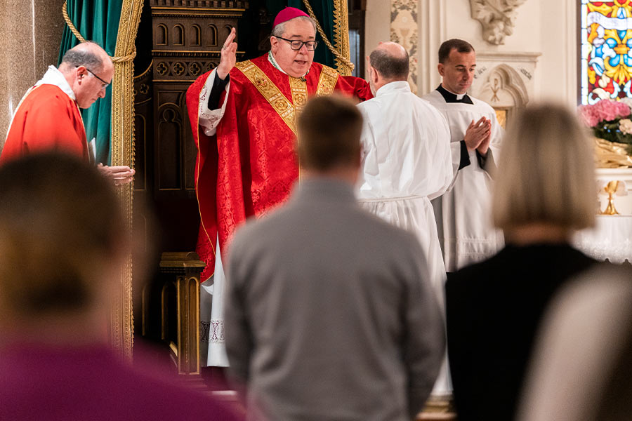 Bishop Michael Olson raises his arms in prayer during the Mass of Reparation for Sins of Sexual Abuse on April 25, 2022 at St. Patrick Cathedral in Fort Worth. (NTC/Juan Guajardo)