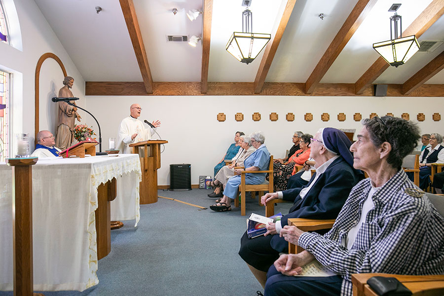 sisters listen to homily