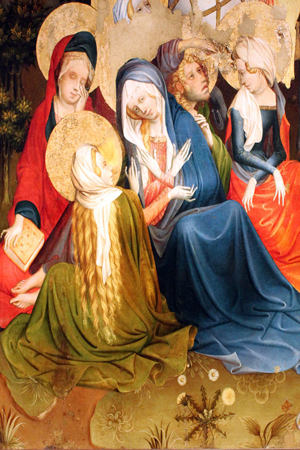 women at foot of cross