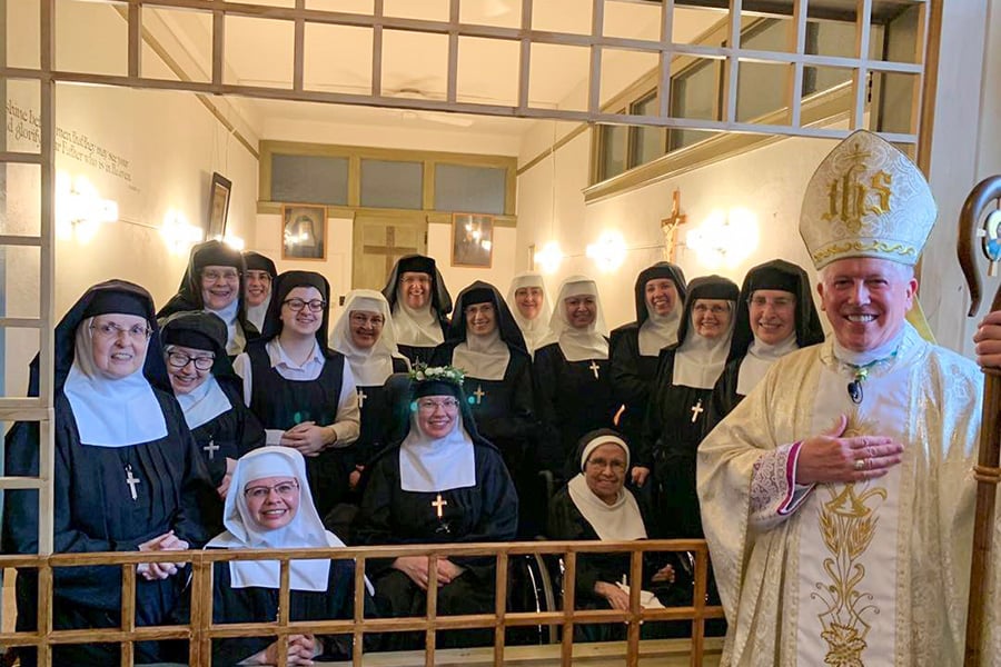 Sister Katherine Chantal surrounded by her community