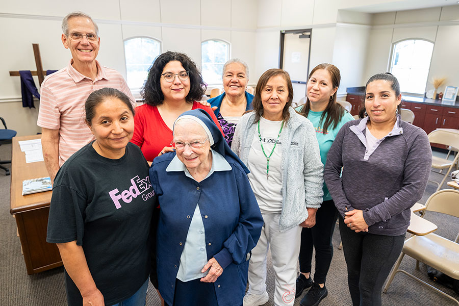 Sister Rita Claire with people