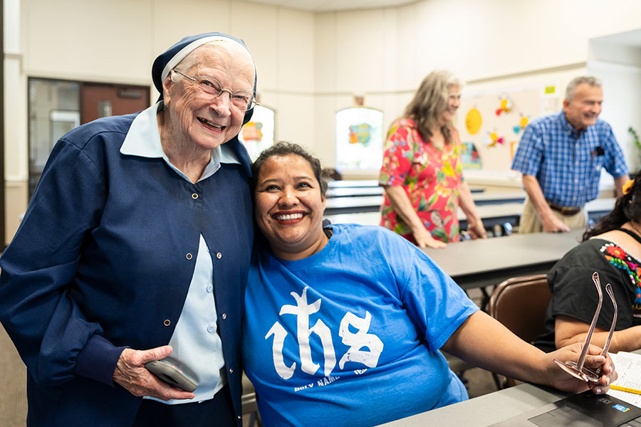 Sister Rita Claire with a student