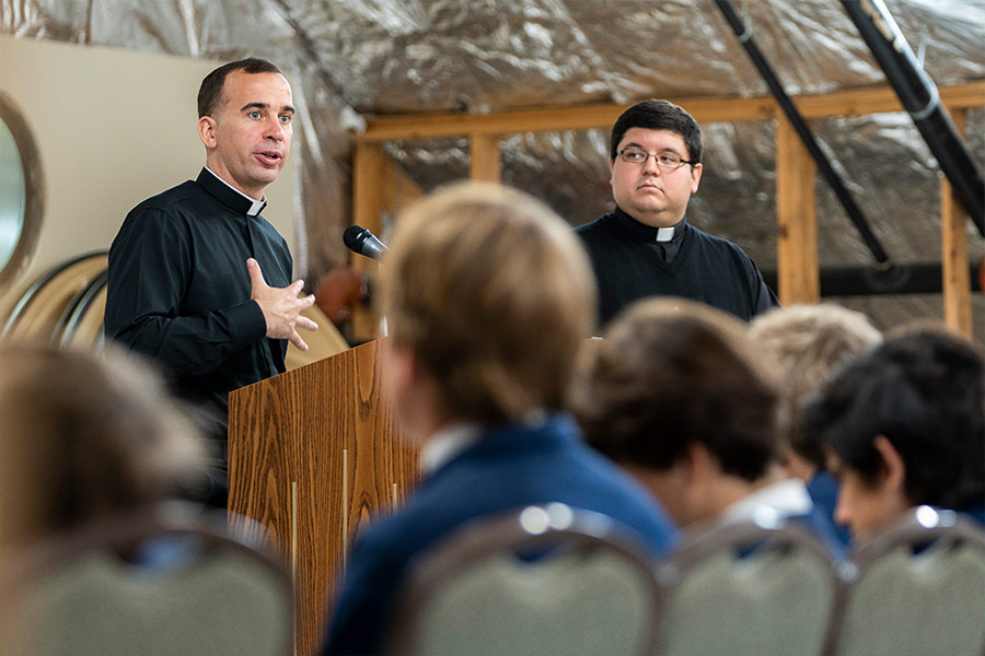 Father Maurice Moon shares his vocation story with the boys at Eighth Grade Vocations Day on April 28, 2022 at the St. Patrick Cathedral parish hall. (NTC/Juan Guajardo)