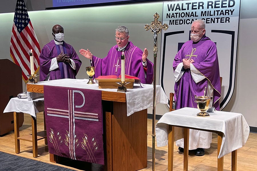 three priests at Walter Reed Hospital