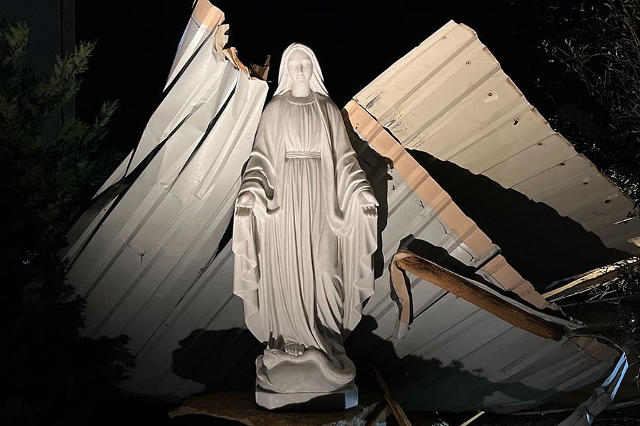 Marian statue stops flyaway roof at St. Stephen Parish in Weatherford