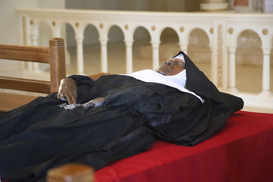 nun lies down