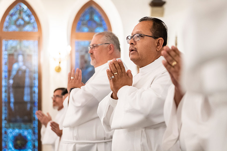 Sergio Vera stands with other members of the diaconal Class of 2022 during the Mass for the Rite of Admission to Candidacy for Holy Orders and Institution of Lectors and Acolytes on Nov. 6, 2021 at St. Patrick Cathedral. Six members of the Class of 2022 were instituted as acolytes by Bishop Michael Olson. (NTC/Juan Guajardo)