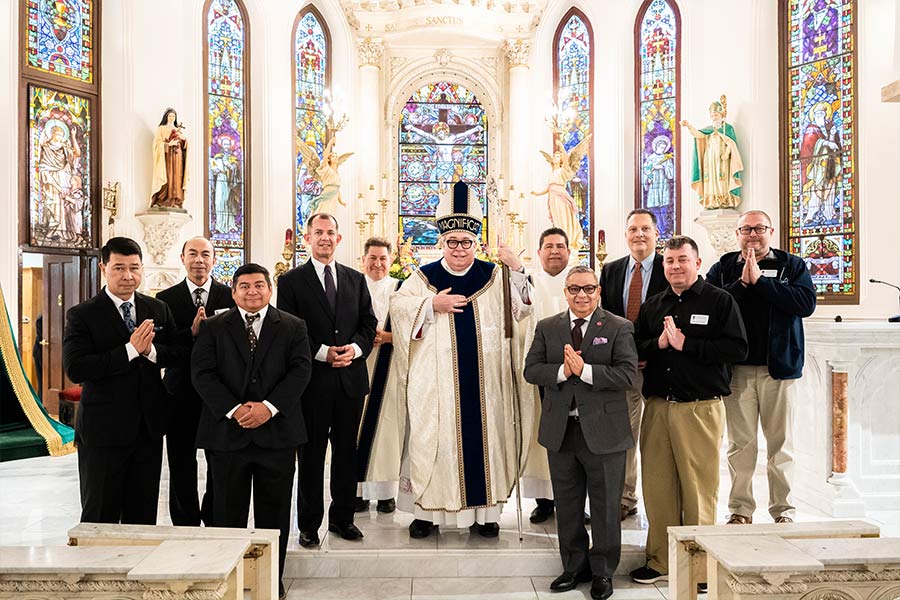 Bishop Michael Olson poses for a photo with aspirants to the permanent diaconate, and Deacons Daniel Zavala and Rigoberto Leyva (to his immediate left and right) on Nov. 6, 2021 at St. Patrick Cathedral. (NTC/Juan Guajardo)