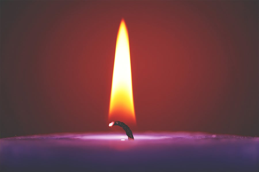 A close-up photo of the flame of an advent candle. (George Becker/Pexels.com)