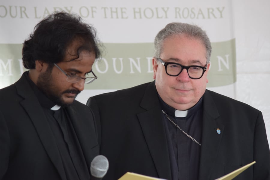 Father Vijaya Mareedu and Bishop Michael Olson
