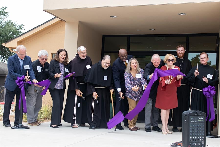 Members of the Catholic Charities leadership team cut ribbon along with priests of Good Shepherd during the ribbon cutting ceremony September 30 at the new Catholic Charities Northeast Campus in Colleyville. (NTC/Jayme Donahue)