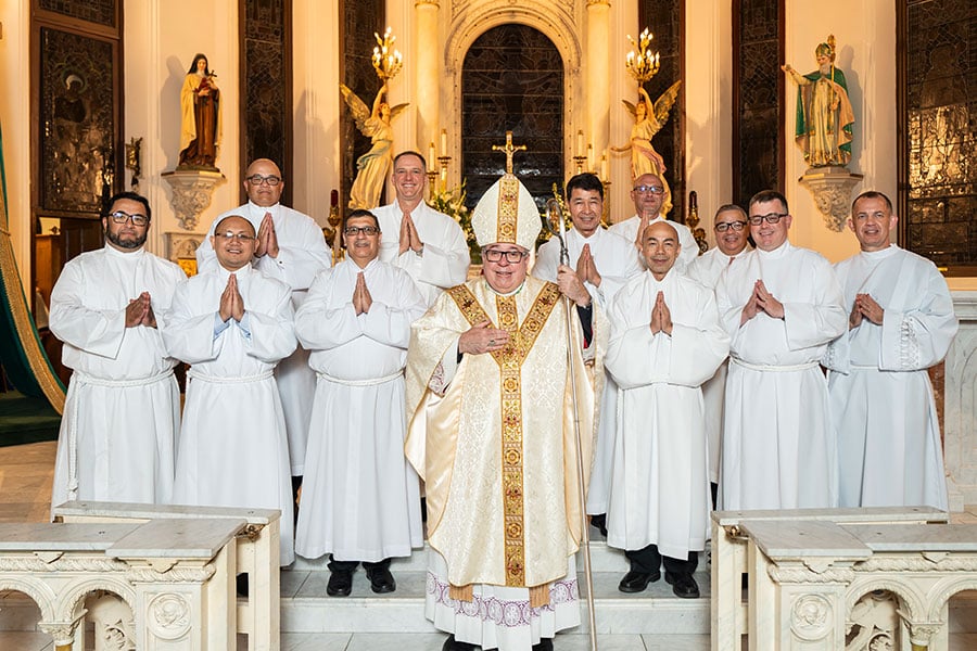 Bishop Olson with the deacon candidates