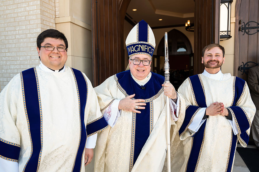 Bishop Olson with Eric Flores and Benjamin Grothouse