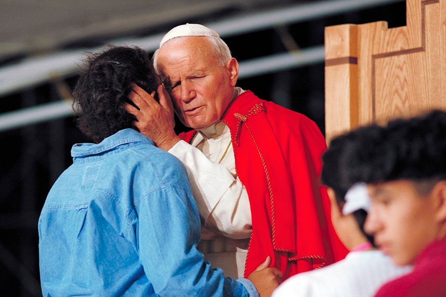 St. Pope John Paul II, shown here at World Youth Day in Denver in 1993, significantly deepened the theology of the domestic church. (CNS photo/Joe Rimkus Jr.)