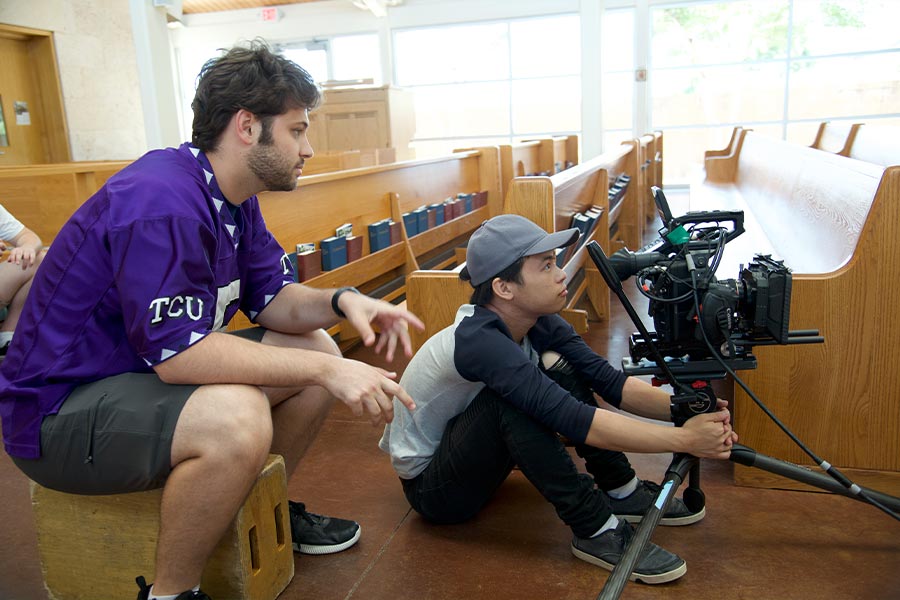 Filmmaker Rob Smat (left) works on set. (Courtesy photo)