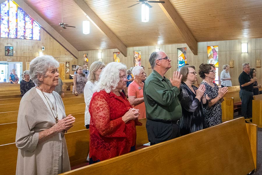 Jean Cate, Mona Edwards, Bob and Celia Wittman, and Patty Lovell make their profession as the St. Clare Fraternity of the Secular Franciscan Order welcomes them into their order on September 12, 2021 at Saint Francis Village in Crowley. (NTC/Rodger Mallison)
