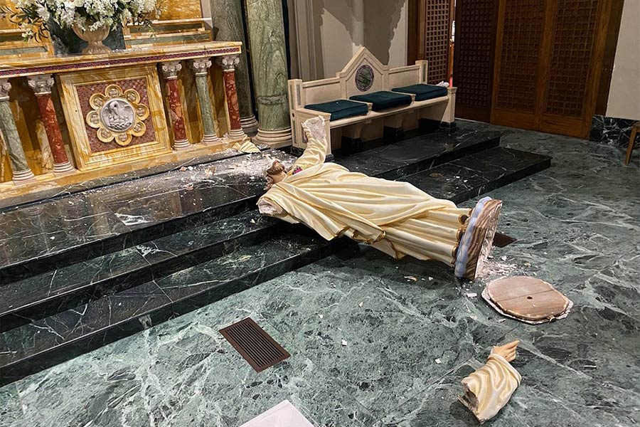 An almost 90-year-old statue of the Sacred Heart of Jesus destroyed on Sept. 15, 2020, is seen at St. Patrick Cathedral in El Paso, TX. Authorities have apprehended a suspect in the vandalism. (CNS photo/Fernie Ceniceros)