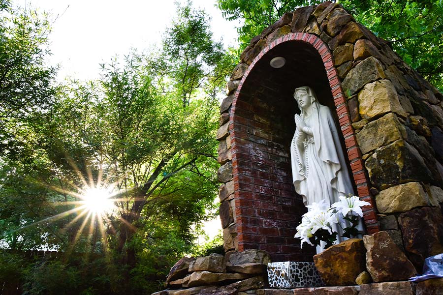 A statue of the Blessed Virgin Mary in the prayer garden of Our Lady of Lourdes Church in Mineral Wells in this 2019 file photo. (NTC/Ben Torres)