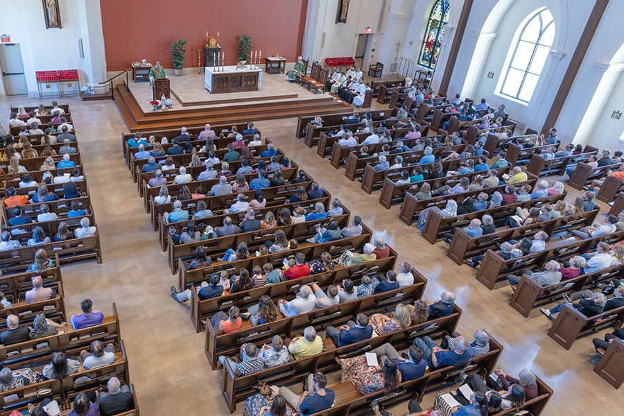 full pews at St. Philip