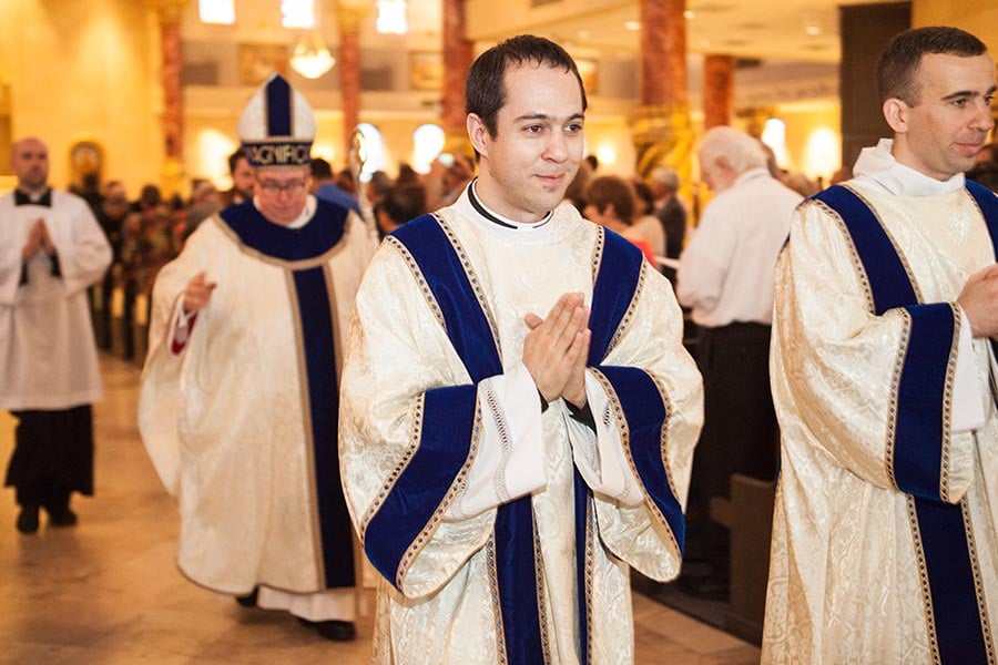 Jonathan Demma processes out after the transitional diaconate ordination Mass.