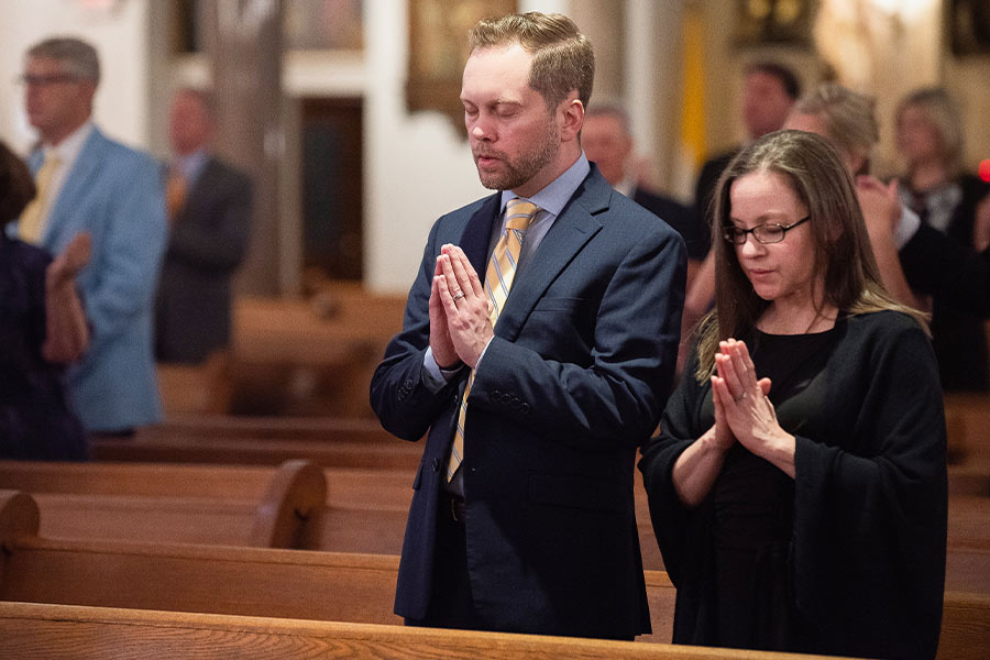 Legatus members Michael and Marna Halloran pray during a special Mass celebrating the 15th anniversary of the Diocese of Fort Worth's Legatus chapter at St. Patrick Cathedral in downtown Fort Worth on May 12, 2022. (NTC/Ben Torres)