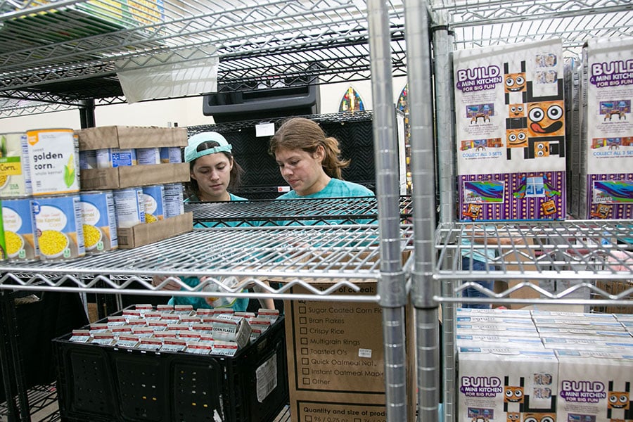 young women at a food pantry