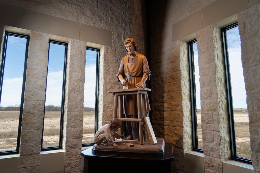 This statue of St. Joseph with the Child Jesus at Holy Redeemer Parish in Aledo was designed by Msgr. Publius Xuereb, pastor. (NTC/Juan Guajardo)