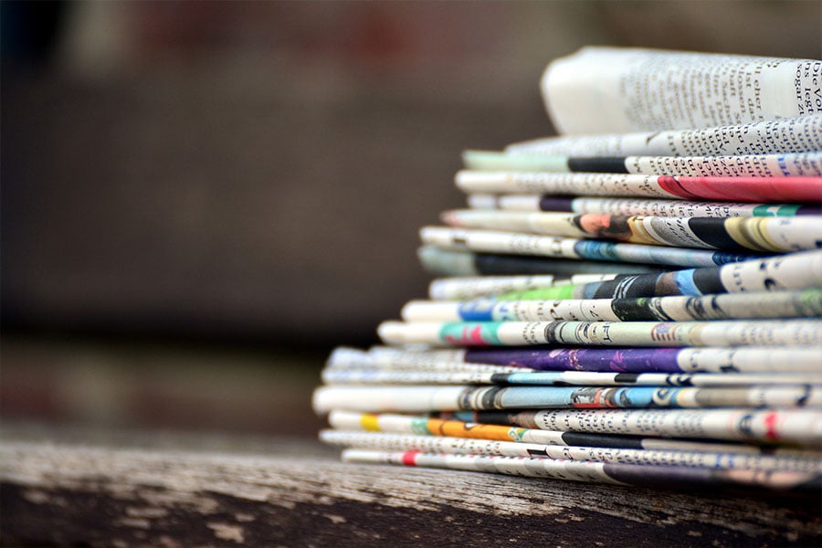 A photo of a stack of newspapers
