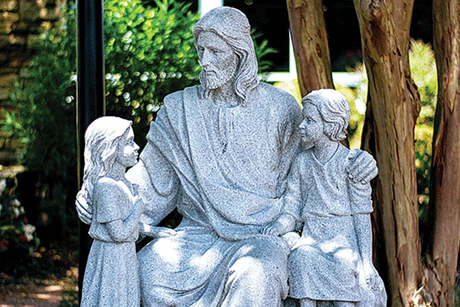 Statue of Jesus with children.