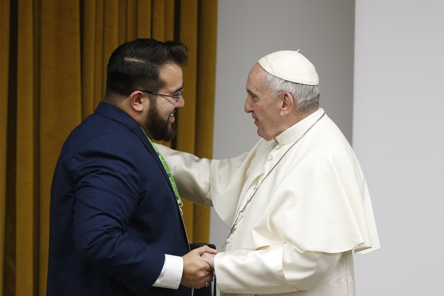 Pope Francis greets Nick Lopez