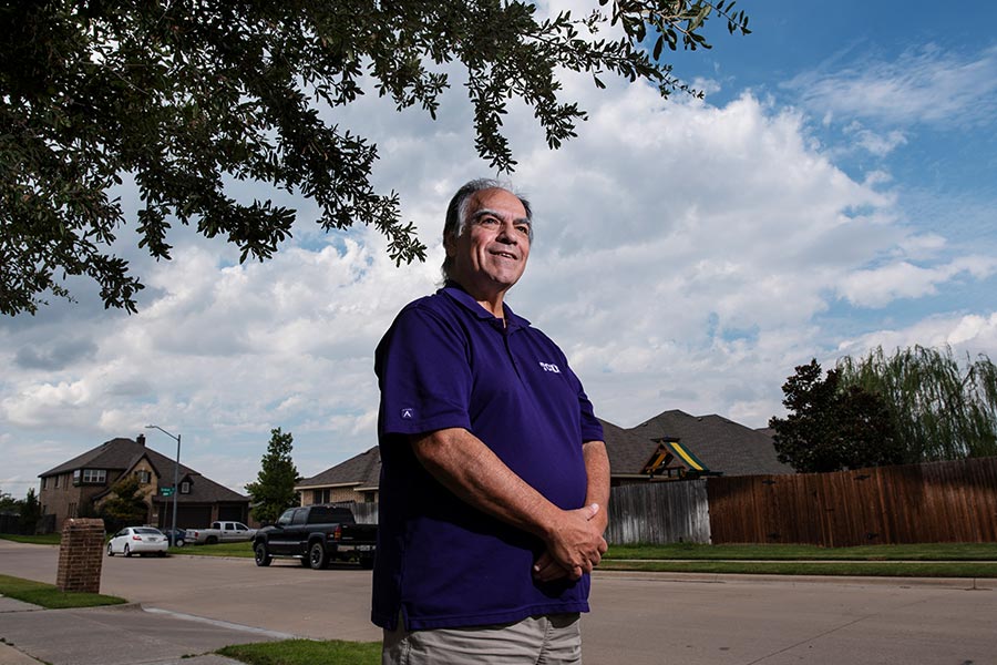 Liver transplant recipient Ron Holton, 65, stands outside of his home in Burleson.