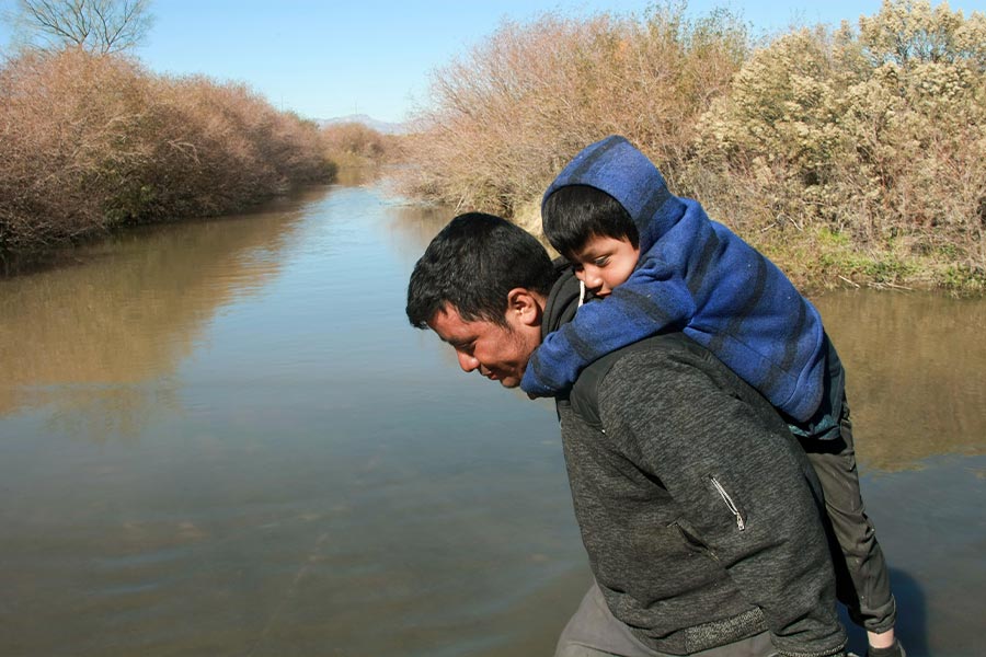 A man and his son in Juarez. (Shutterstock/David Peinado Romero)